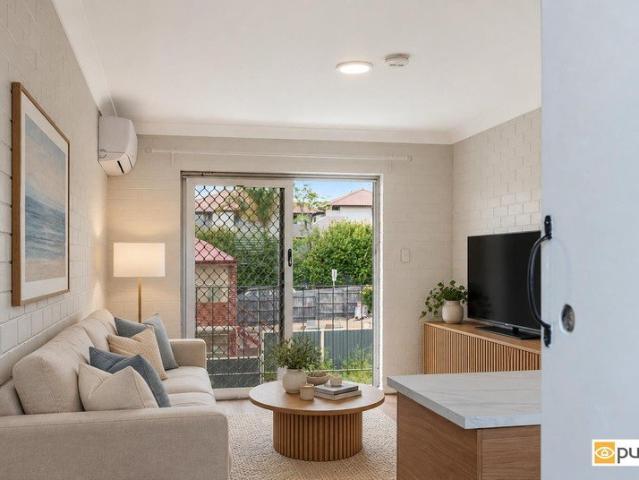 MODERNLY RENOVATED WEMBLEY APARTMENT IN PRIME LOCATION