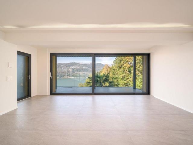 MODERNO APPARTAMENTO DI 3.5 LOCALI CON VISTA LAGO