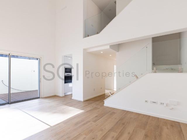 Moradia moderna com pé direito duplo e garagem na Costa 0m² Costa Da Caparica