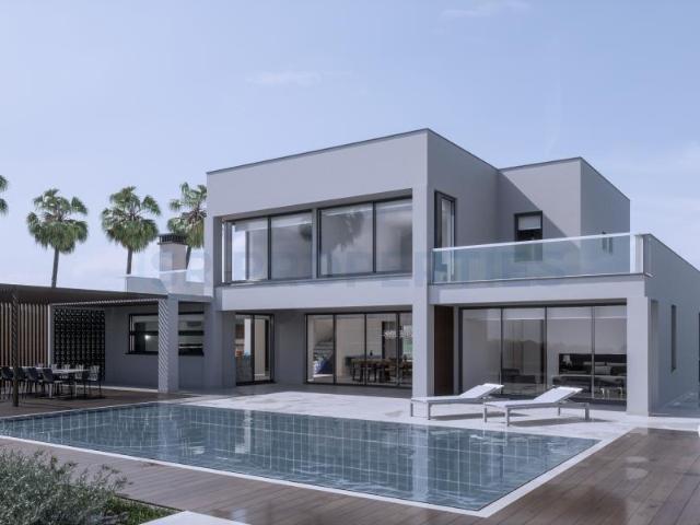 Moradia nova de estilo contemporâneo, com piscina e acabamen. 295m² Lagos Santa Maria