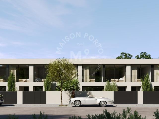 Moradia Familiar T4 com 2 Suites, Varanda, Pátio, Garagem e Jardins em Paramos, Espinho