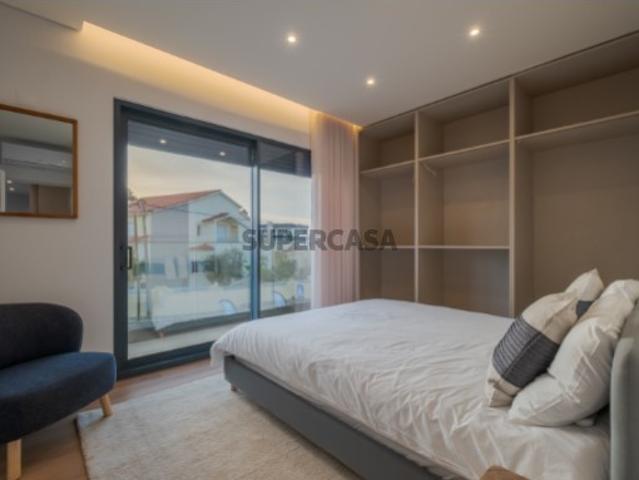 Moradia geminada T3 de arquitetura contemporânea, com garagem e piscina Herdade do Meio
