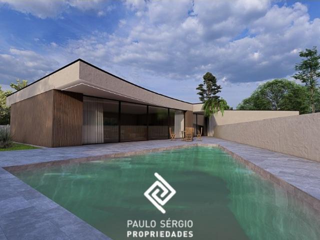 Moradia isolada térrea T4 de luxo com piscina no Centro de Santa Maria da Feira, próximo ao Liceu
