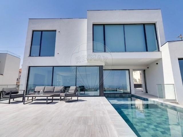Moradia T4 à venda em Vialonga, Vila Franca de Xira RE/MAX Portugal