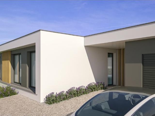 MORADIA T4 TÉRREA DE ARQUITETURA MODERNA COM PISCINA NADADOURO