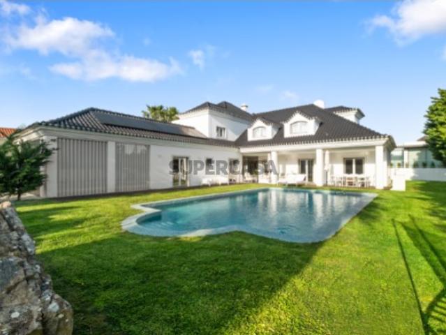 Moradia T6 com jardim e piscina na Quinta da Beloura