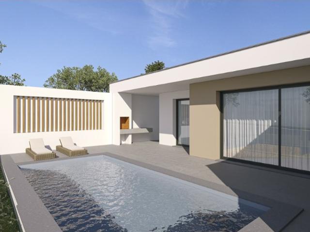 MORADIA T3 TÉRREA DE ARQUITETURA MODERNA COM PISCINA NADADOURO
