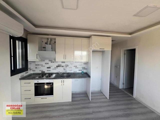 Mordoğan Emlaktan Mıgros Jet Karşısı Merkezde 1+1 Kiralık