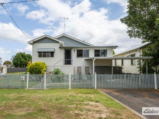 More Home Than You Expect in the Heart of Town