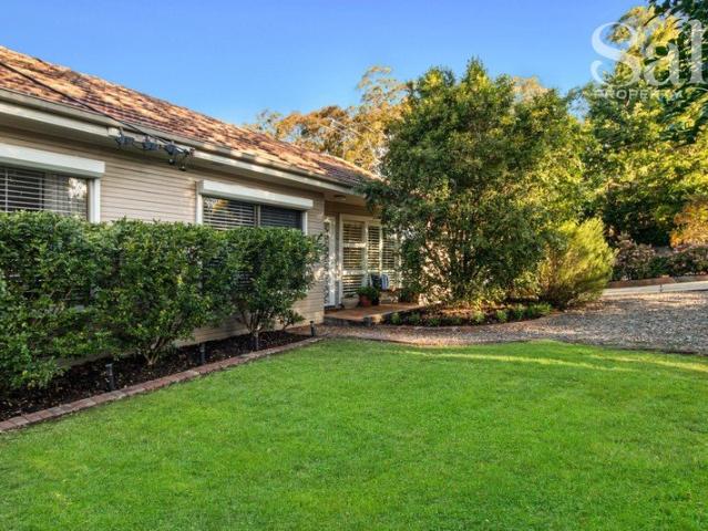 More space than meets the eye with a peaceful backyard & pool