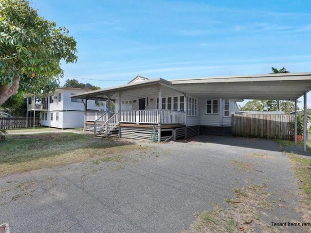 More Than Meets the Eye Two Bedrooms, Two Sleepouts, Shed & Side Access!