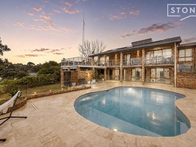 Mountain Views, Dual Level Living and Space for Every Generation