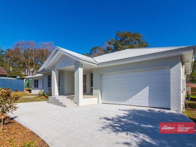 Move In Ready Brand New McDonald Jones Home