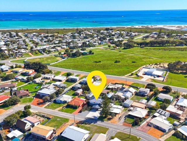 Move In Ready Coastal Retreat with Dual Living Potential!