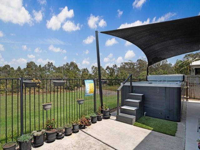 MOVE IN READY FAMILY HOME WITH A VIEW!