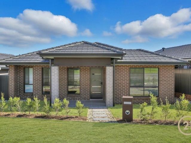 Move In Ready Family Home with Premium Upgrades in Meadows Estate