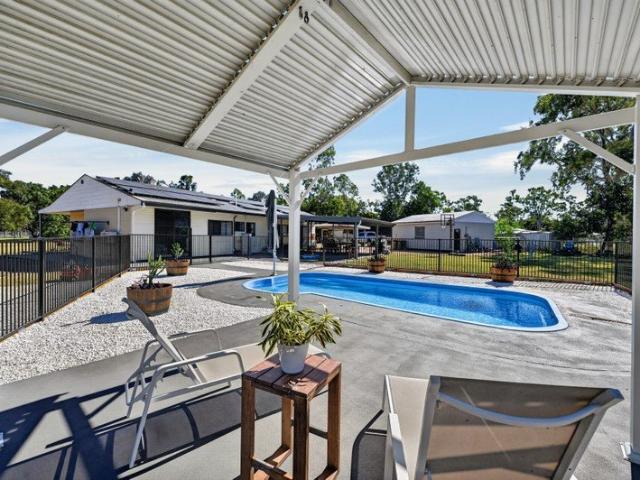 MOVE IN READY! Privacy, Space & Lifestyle on Nearly Two Acres!