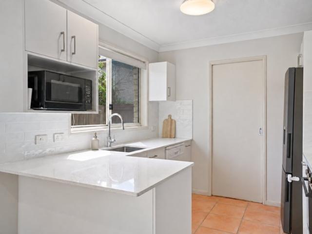 Move In Ready Townhouse with Quality Updates & Resort Style Living