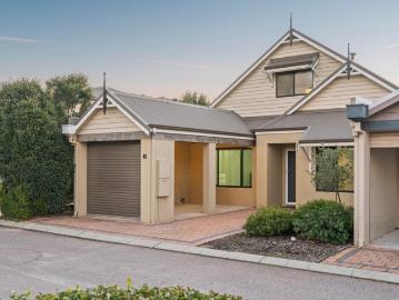 MOVE IN READY TOWNHOUSE IN GATED RESORT STYLE COMPLEX