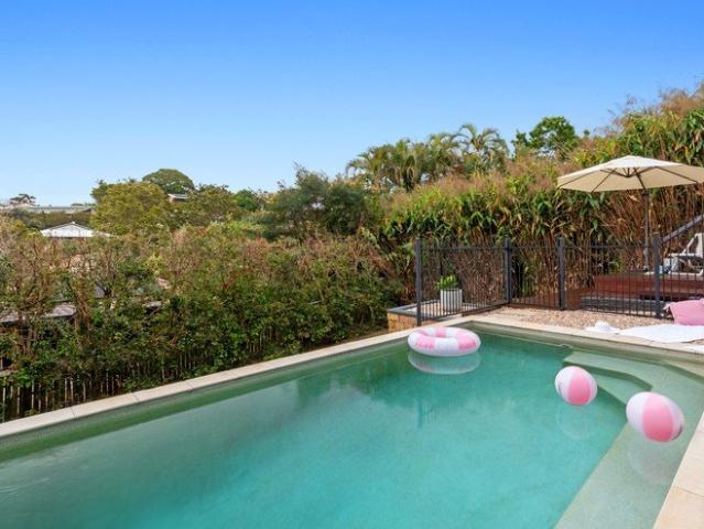 Move in ready with a sparkling pool and flexible living across two levels, close to Woombye village and within easy reach of Sunshine Coast beaches