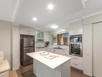 Rare Ground Floor, Move In Ready Unit with Modern Comforts & Secure Garage