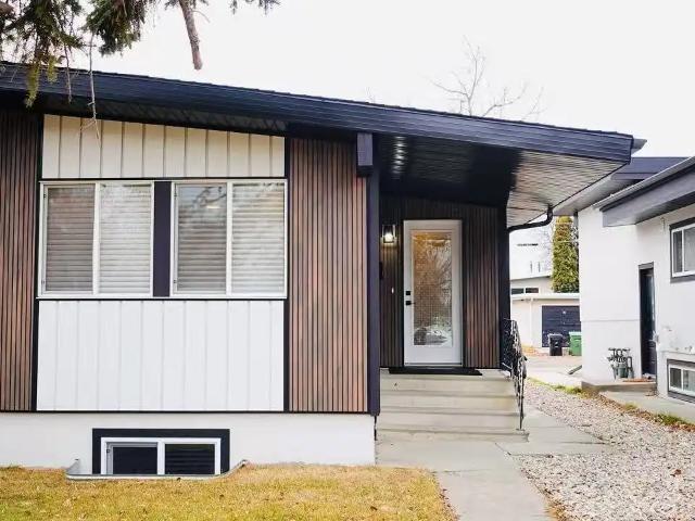 Move in Ready 2 BR Main Floor with Private Garage & New Appliances
