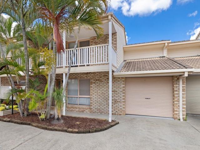 MOVE STRAIGHT IN FULLY RENOVATED TOWHOUSE PRIVATE COURTYARD & POOL!
