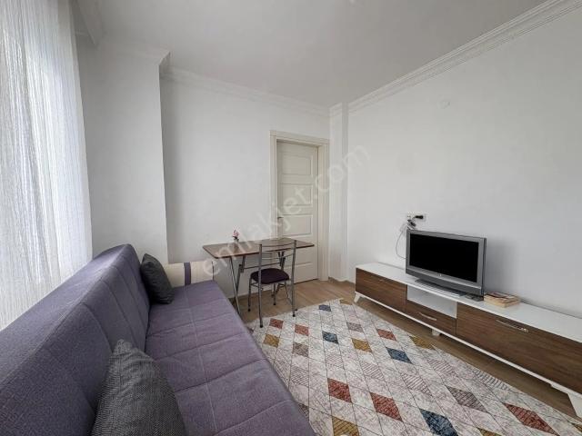 Muğla Yeniköy'de Meydana Çok Yakın Eşyalı 1+1 Kiralık Daire