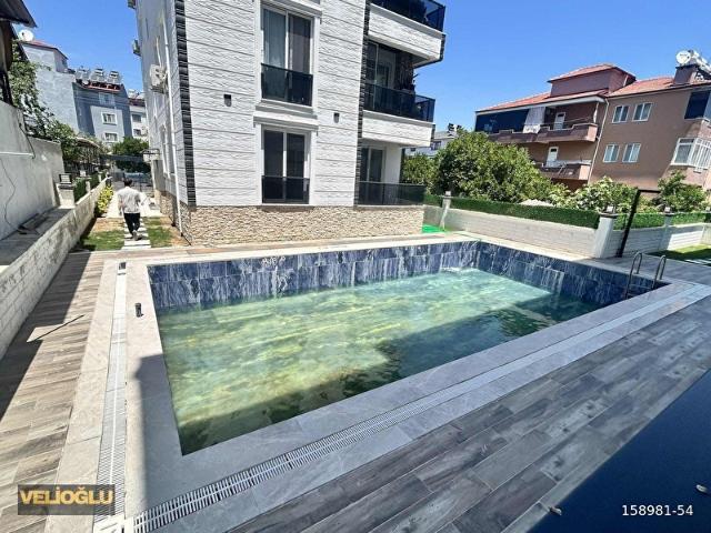 MUĞLA DALAMAN MERKEZDE KİRALIK HAVUZLU UZUN DÖNEM 1+1 DAİRE