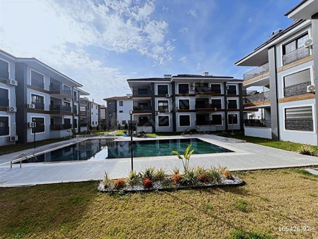 MUĞLA ORTACA HAVUZLU SİTEDE KAPALI MUTFAK SATILIK DAİRE