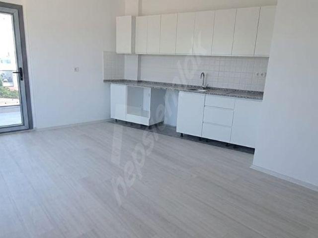 MUMCULAR MERKEZ'DE ARA KAT 1+1 SATILIK DAİRE