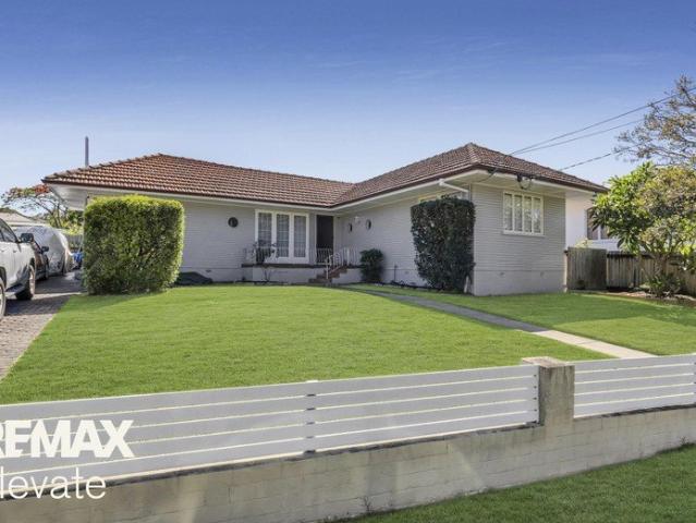 MUCH LOVED AND METICULOUSLY MAINTAINED HOME WITH ELEVATED ENTERTAINING