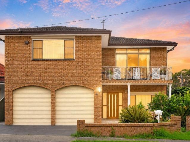 Multi Generational Family Living at Its Finest | Full Brick, Fully Renovated & Exceptionally Versatile