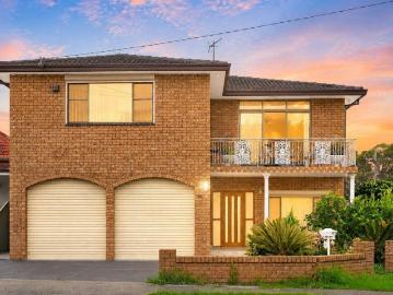 Multi Generational Family Living at Its Finest | Full Brick, Fully Renovated & Exceptionally Versatile
