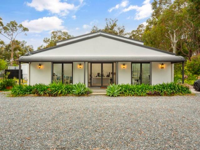 MULTI PURPOSE MASTERPIECE WITH OCEAN VIEWS & DEVELOPMENT UPSIDE!