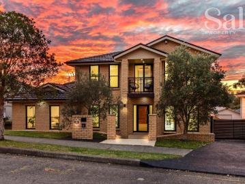 Multiple living zones, 3 car garage, panoramic views, 2.5km to beach