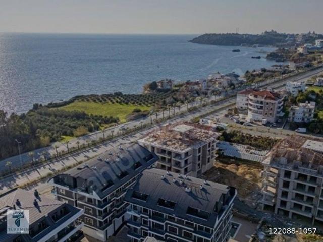 MURAT TÜRKMEN'den TAKASA_uygun ALANYA'da DENİZE_sıfır FULL_yapılı SIFIR_eşyalı ARA_katta 1+1_DAİRE
