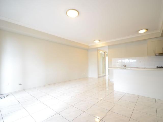 Must Inspect Fully Tiled Two Bedroom Unit with Built Ins