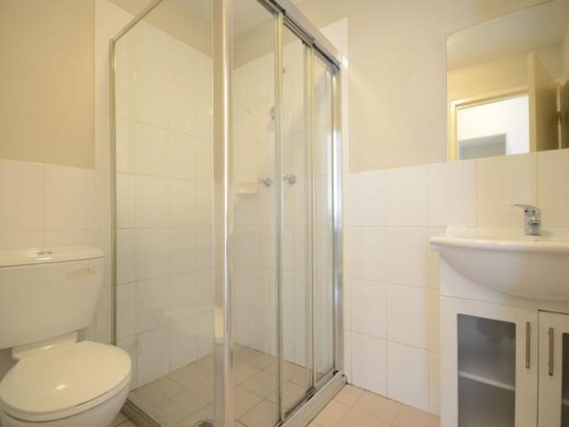 Must inspect Fully tiled two bedroom unit with built ins