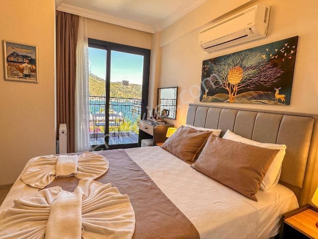 Mykonut'tan Fethiye Karagözlerde Kiralık Deniz Manzaralı Oda
