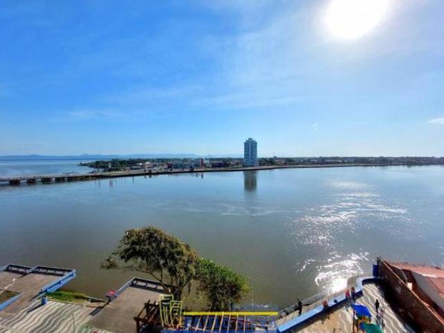 Na beira do rio em Tramandaí, apartamento com quatro quartos, mobiliado, com uma linda vista panorâ
