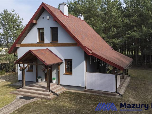 Na sprzedaż nowoczesny dom 108,5 m² z lasem i tarasem w Świętajnie