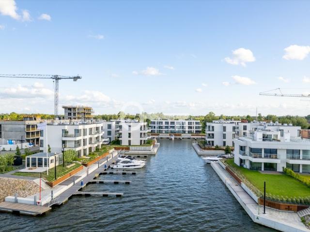Na sprzedaż apartament z ogródkiem i prywatną mariną