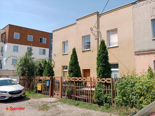 Na sprzedaż funkcjonalny dom z 4 niezależnymi mieszkaniami 120 m²