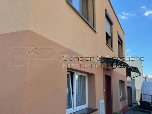 Na sprzedaż przestronny dom 120 m² z lokalem 250 m² w Chodzieży