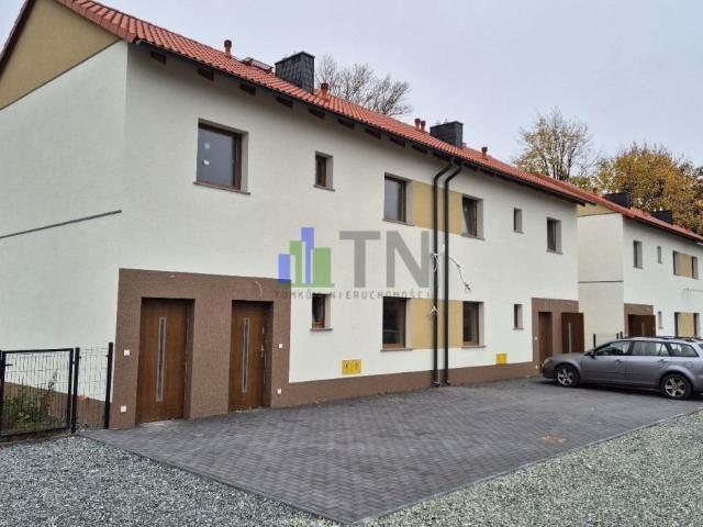 Na sprzedaż przestronne mieszkanie 49 m² z ogrodem w Miłoszycach