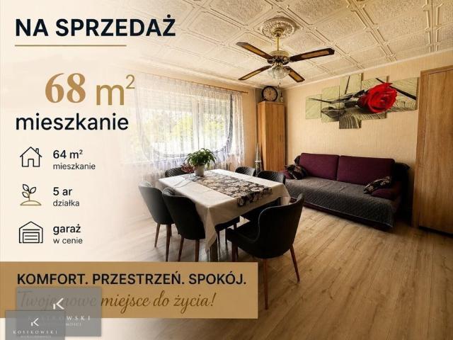 Na sprzedaż przestronne 3 pokojowe mieszkanie z garażem i działką