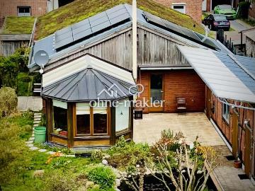 Nachhaltiger Bungalow mit Wintergarten, Garage und Garten