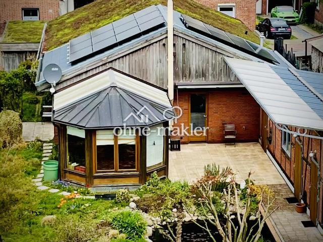 Nachhaltiger Bungalow mit Wintergarten, Garage und Garten