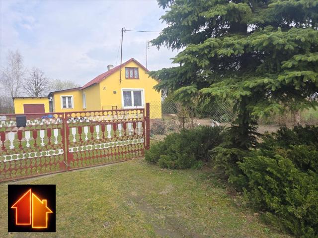 Urokliwy dom 60 m2 z garażem i dużą działką